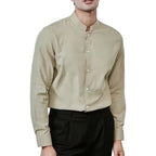 Man wearing a beige long-sleeve shirt with a mandarin collar against a white background