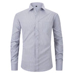 Patterned shirt on a white background with brand label.