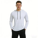 Man wearing a white hoodie with black drawstrings on a white background