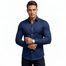 Person wearing a blue dress shirt with a white background