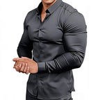 Gray dress shirt worn by a person on a white background